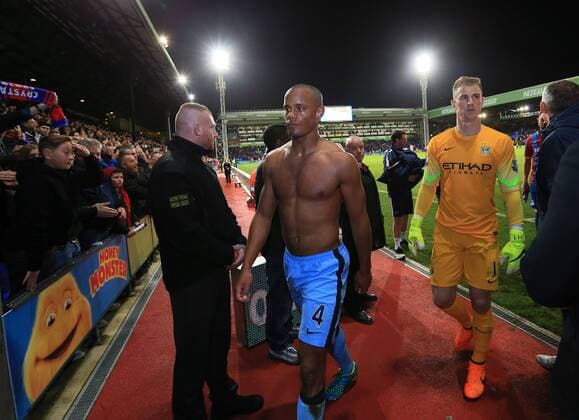 Manchester City s Vincent Kompany and Joe Hart look on dejected at the final whistle Barclays Premier League- Crystal Palace vs Manchester City - Selhurst Park - England - 6th April 2015 - Picture David Klein Sportimage EDITORIAL USE ONLY. No use with unauthorised audio, video, data, fixture lists, club league logos or live services. Online in-match use limited to 120 images, no video emulation. No use in betting, games or single club league player publications.