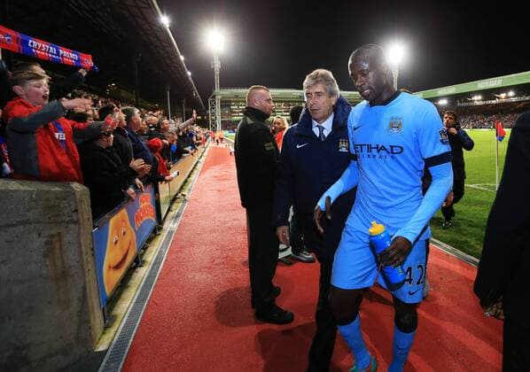Manchester City s Manue Pellegrini and Yaya Toure look on dejected at the final whistle Barclays Premier League- Crystal Palace vs Manchester City - Selhurst Park - England - 6th April 2015 - Picture David Klein Sportimage EDITORIAL USE ONLY. No use with unauthorised audio, video, data, fixture lists, club league logos or live services. Online in-match use limited to 120 images, no video emulation. No use in betting, games or single club league player publications.