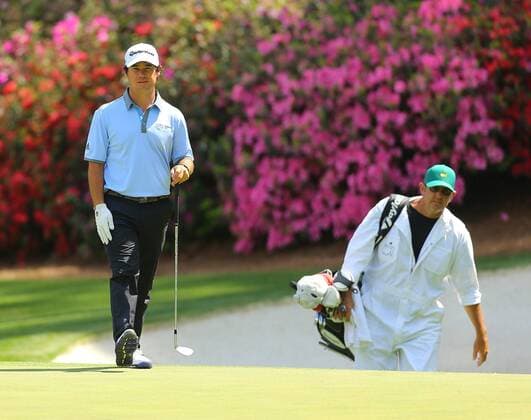 April 6, 2015 - Augusta, GA, USA - Former UGA golfer Brian Harman and his caddy walk up to the 13th green during his practice round for the Masters on Monday, April 6, 2015, at Augusta National Golf Club in Augusta, Ga. Masters practice round - ZUMAm67_