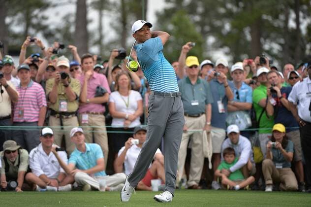 Tiger Woods watches his drive off of the 1st tee during a practice round prior to the 2015 Masters Tournament at Augusta, National in Augusta, Georgia on April 6, 2015.  AUG20150406321 KEVINxDIETSCH