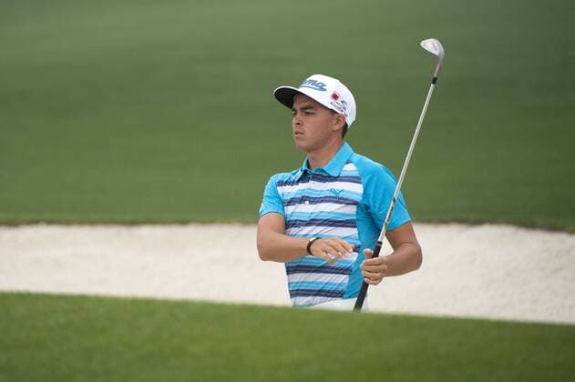 Rickie Fowler hits out of a bunker on the 2nd hole during a practice round the 2015 Masters Tournament at Augusta, National in Augusta, Georgia on April 7, 2015.  AUG20150407308 KEVINxDIETSCH