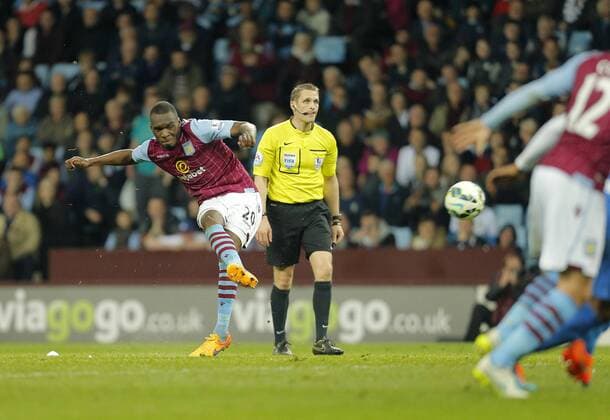 Christian Benteke of Aston Villa completes his hat-trick with a curling free-kick Football - Barclays Premier League - Aston Villa vs Queens Park Rangers - Villa Park Birmingham - Season 2014 15 - 7th April 2015 - Photo Malcolm Couzens Sportimage EDITORIAL USE ONLY. No use with unauthorised audio, video, data, fixture lists, club league logos or live services. Online in-match use limited to 120 images, no video emulation. No use in betting, games or single club league player publications.