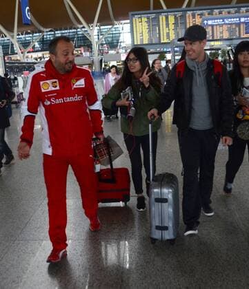 German F1 driver Sebastian Vettel of Ferrari, right, is pictured after arriving at the Shanghai Pudong International Airport in Shanghai, China, 8 April 2015. Sebastian Vettel receives warm welcome in Shanghai  pbu255940_05