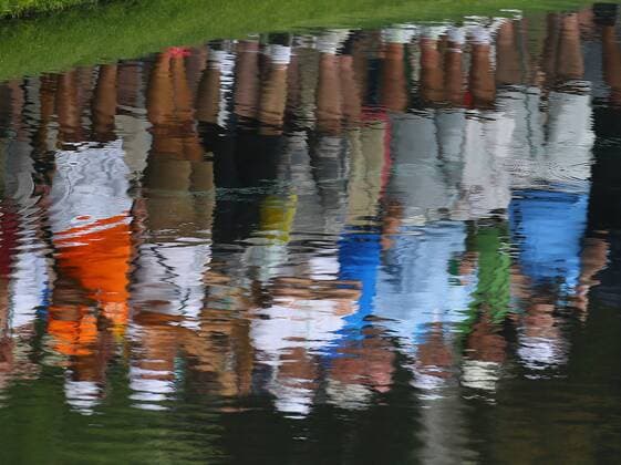 April 8, 2015 - Augusta, GA, USA - Masters patrons are reflected in the pond at the 16th green during practice on Wednesday, April 8, 2015, at Augusta National Golf Club in Augusta, Ga. Masters practice April 8 - ZUMAm67_