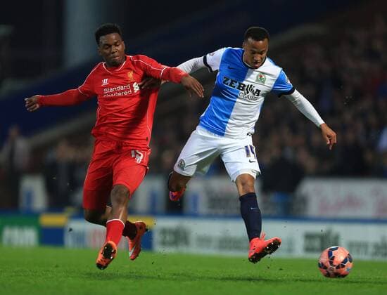 Daniel Sturridge of Liverpool battles Marcus Olsson of Blackburn Rovers - Blackburn Rovers vs. Liverpool - The FA Cup - Quarter Final replay - Ewood Park - Blackburn - 08 04 2015 Pic Philip Oldham Sportimage EDITORIAL USE ONLY. No use with unauthorised audio, video, data, fixture lists, club league logos or live services. Online in-match use limited to 120 images, no video emulation. No use in betting, games or single club league player publications.