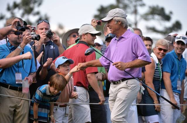 Ben Crenshaw greets patrons before hitting off of the 18th tee during a practice round at the 2015 Masters Tournament at Augusta, National in Augusta, Georgia on April 8, 2015.  AUG20150408311 KEVINxDIETSCH