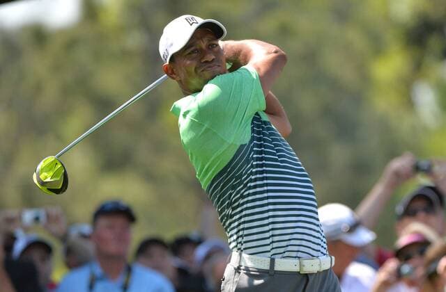 Tiger Woods hits off of the 18th tee during a practice round at the 2015 Masters Tournament at Augusta, National in Augusta, Georgia on April 8, 2015.  AUG20150408316 KEVINxDIETSCH
