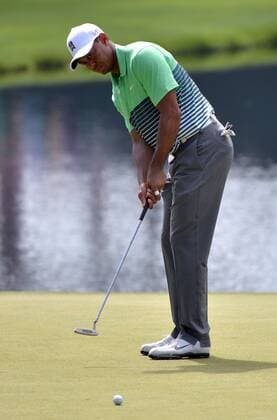 Tiger Woods putts on the 16th green during a practice round at the 2015 Masters Tournament at Augusta, National in Augusta, Georgia on April 8, 2015.  AUG20150408305 KEVINxDIETSCH
