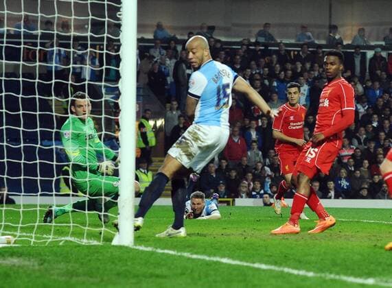 Football - 2014 2015 FA Cup round 6 Replay - Blackburn Rovers v Liverpool Philippe Coutinho of Liverpool scores his goal past goalkeeper, Simon Eastwood at Ewood Park COLORSPORT ANDREW COWIE 