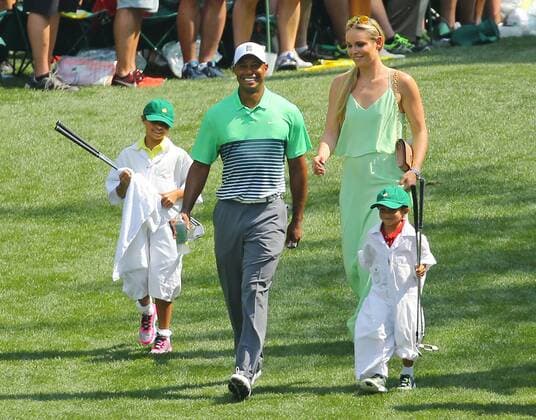 April 8, 2015 - Augusta, Georgia, U.S. - TIGER WOODS, LINDSEY VONN, and his children SAM and CHARLIE walk down the sixth fairway during the Par 3 Contest on Wednesday at Augusta National Golf Club. Golf 2015 - The Masters - Practice Round - ZUMAm67_