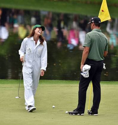 April 8, 2015 - Augusta, GA, USA - Gary Woodland s partner, Gabby Granado, smiles as she misses a putt during the Par 3 Contest on Wednesday, April 8, 2015, at Augusta National Golf Club in Augusta, Ga. Masters practice April 8 - ZUMAm67_