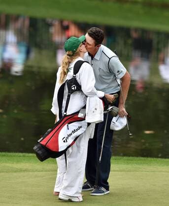 April 8, 2015 - Augusta, GA, USA - Justin Rose gets a kiss from his wife, Kate Phillips, during the Par 3 Contest on Wednesday, April 8, 2015, at Augusta National Golf Club in Augusta, Ga. Masters practice April 8 - ZUMAm67_