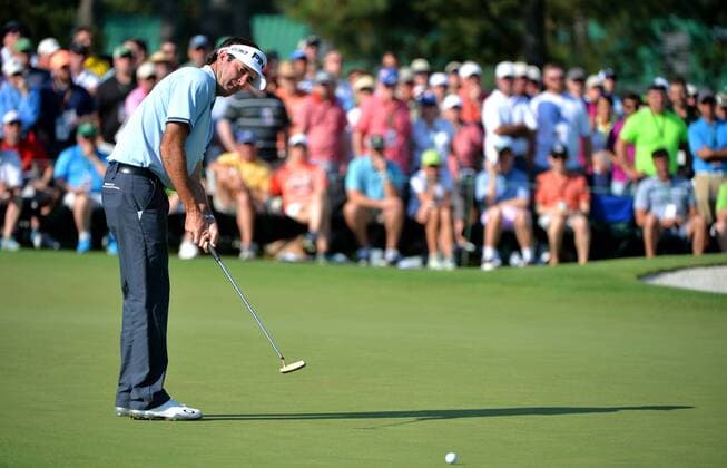 Bubba Watson putts for eagle on the second green in the first round of the 2015 Masters Tournament at Augusta National Golf Club in Augusta, Georgia on April 9, 2015.  MAS20150409129 KEVINxDIETSCH