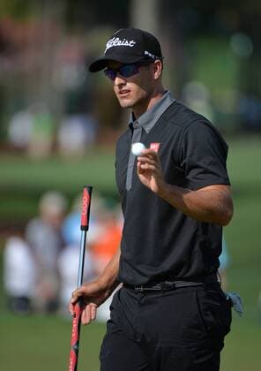 Adam Scott reacts after making a putt for par on the second green using his belly putter in the first round the 2015 Masters Tournament at Augusta National Golf Club in Augusta, Georgia on April 9, 2015.  MAS20150409160 KEVINxDIETSCH