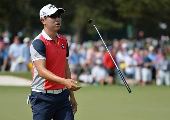 Sangmoon Bae from Korea flips his putter after missing a putt on the second hole in the first round of the 2015 Masters Tournament at Augusta National Golf Club in Augusta, Georgia on April 9, 2015.  MAS20150409167 KEVINxDIETSCH