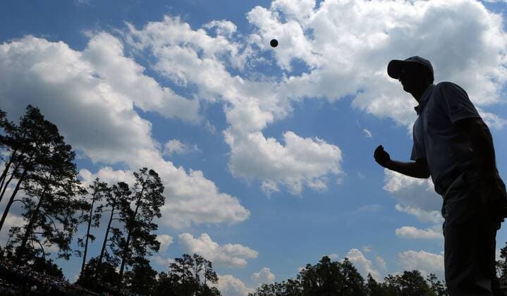 April 9, 2015 - Augusta, Georgia, U.S. - JUSTIN ROSE throws his ball to the gallery as he walks off 13 green following a birdie to go to 4-under during the first round at the Masters Golf Tournament Thursday. Golf 2015 - Masters Tournament - Round 1 - ZUMAm67_