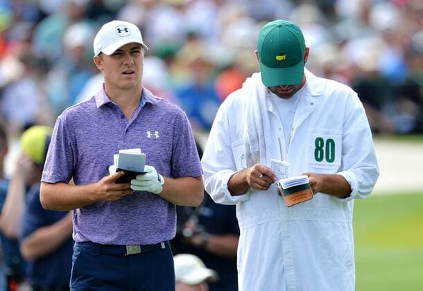 Jordan Spieth and caddie Michael Greller stand on the 3rd hole tee box in the second round of the 2015 Masters Tournament at Augusta National Golf Club in Augusta, Georgia on April 10, 2015.  AUG20150410109 KEVINxDIETSCH