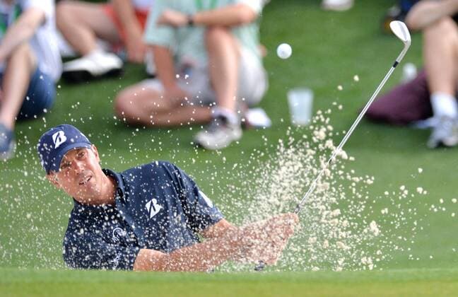 Matt Kuchar hits out of a bunker on the 2nd hole in the second round of the 2015 Masters Tournament at Augusta National Golf Club in Augusta, Georgia on April 10, 2015.  AUG20150410112 KEVINxDIETSCH