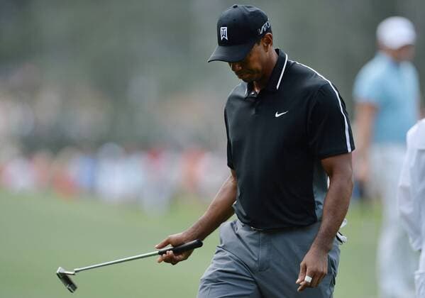 Tiger Woods walks off of the 3rd green in the second round of the 2015 Masters Tournament at Augusta National Golf Club in Augusta, Georgia on April 10, 2015.  AUG20150410133 KEVINxDIETSCH