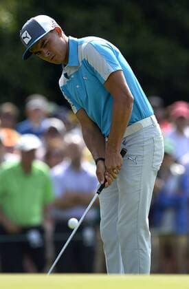 April 10, 2015 - Augusta, GA, USA - Rickie Fowler chips his ball onto the first greenat Augusta National Golf Club during second round action in the Masters on Friday, April 10, 2015 in Augusta, Fla. Masters Day 2 - ZUMAm67_