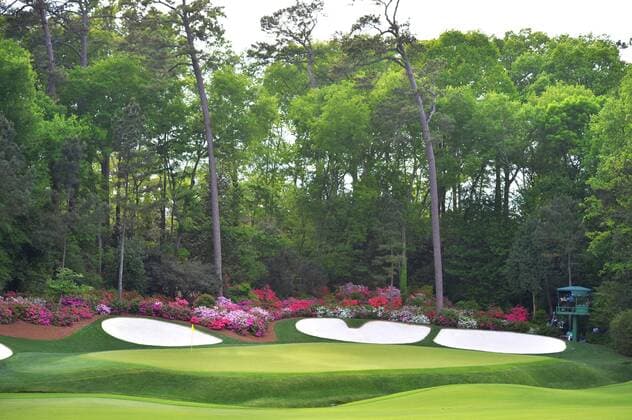 Azaleas are in full bloom on the 13th hole in the second round of the 2015 Masters Tournament at Augusta National Golf Club in Augusta, Georgia on April 10, 2015.  AUG20150410150 KEVINxDIETSCH