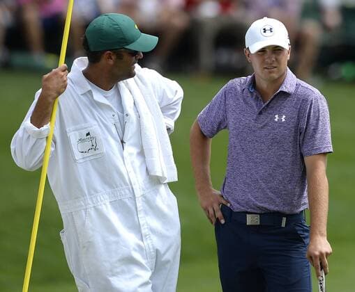 April 10, 2015 - Augusta, GA, USA - Jordan Spieth, right, and his caddie, Michael Greller, left, talk along the 16th green during second round action of the Masters at Augusta National Golf Club on Friday, April 10, 2015 in Augusta, Ga. Masters day 2 - ZUMAm67_
