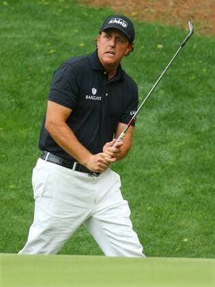 April 10, 2015 - Augusta, GA, USA - Phil Mickelson reacts as he almost chips in from off the edge with an eagle attempt on the 13th hole during the second round of the Masters at Augusta National Golf Club on Friday, April 10, 2015, in Augusta, Ga. Masters day 2 - ZUMAm67_