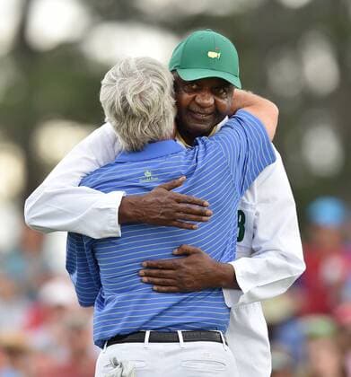 April 10, 2015 - Augusta, GA, USA - Ben Crenshaw hugs his long-time caddie, Carl Jackson, at the end of his final Masters round during the second round of the Masters at Augusta National Golf Club on Friday, April 10, 2015, in Augusta, Ga. Jackson was unable to caddie for Crenshaw this week due to medical issues. Masters day 2 - ZUMAm67_