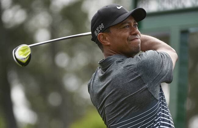 Tiger Woods tees off on the 1st hole in the third round of the 2015 Masters Tournament at Augusta National Golf Club in Augusta, Georgia on April 11, 2015.  AUG20150411103 KEVINxDIETSCH
