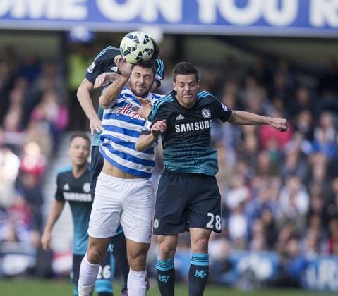 12.04.2015. London, England. Barclays Premier League. Queens Park Rangers QPR versus FC Chelsea. QPR s Charlie Austin and Chelsea s Cesar Azpilicueta battle for the header. xNigelxCookex  ActionPlus11612760