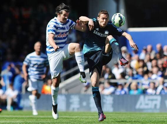 Football - 2015 Premier League QPR Queens Park Rangers v FC Chelsea Nemanja Matic of Chelsea and Joey Barton 0f QPR at Loftus road COLORSPORT ANDREW COWIE 