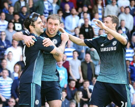 Chelsea s Cesc Fabregas celebrates scoring his sides opening goal Barclays Premier League- Queens Park Rangers vs Chelsea - Loftus Road - England - 12h April 2015 - Picture David Klein Sportimage EDITORIAL USE ONLY. No use with unauthorised audio, video, data, fixture lists, club league logos or live services. Online in-match use limited to 120 images, no video emulation. No use in betting, games or single club league player publications.