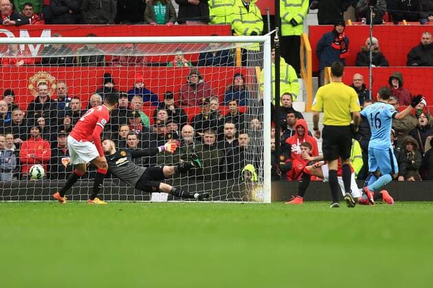 Sergio Aguero of Manchester City scores a consolation goal - Manchester United ManU vs. Manchester City - Barclay s Premier League - Old Trafford - Manchester - 12 04 2015 Pic Philip Oldham Sportimage EDITORIAL USE ONLY. No use with unauthorised audio, video, data, fixture lists, club league logos or live services. Online in-match use limited to 120 images, no video emulation. No use in betting, games or single club league player publications.