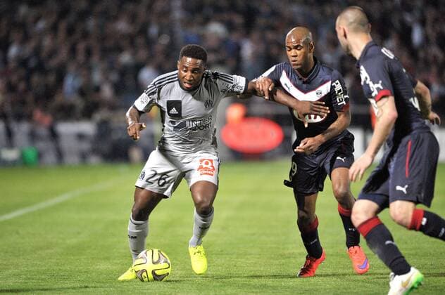 Brice DJADJEDJE (om) - DIEGO ROLAN (bor) FOOTBALL : Bordeaux vs Marseille - Ligue 1 - 12 04 2015 FEP Panoramic 