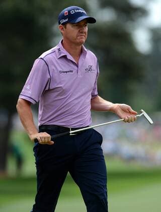April 12, 2015 - Augusta, GA, USA - Jimmy Walker walks off the second green after sinking a putt during the final round of the Masters on Sunday, April 12, 2015, at Augusta National Golf Club in Augusta, Ga. Masters final round - ZUMAm67_