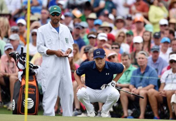 April 12, 2015 - Augusta, GA, USA - Jordan Spieth and his caddie, Michael Greller, line up his eagle attempt on No. 2 during the final round of the Masters on Sunday, April 12, 2015, at Augusta National Golf Club in Augusta, Ga. Masters final round - ZUMAm67_