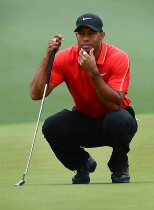 April 12, 2015 - Augusta, GA, USA - Tiger Woods looks over the second green prior to putting during the final round of the Masters on Sunday, April 12, 2015, at Augusta National Golf Club in Augusta, Ga. Masters final round - ZUMAm67_