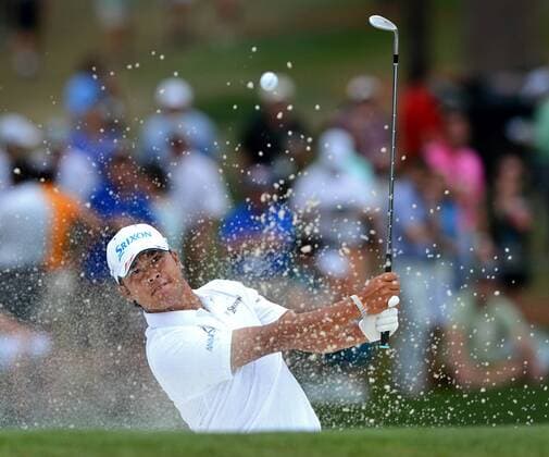 April 12, 2015 - Augusta, GA, USA - Hideki Matsuyama chips out of a sand bunker along the 10th green during the final round of the Masters on Sunday, April 12, 2015, at Augusta National Golf Club in Augusta, Ga. Masters final round - ZUMAm67_