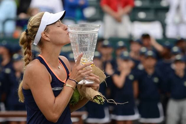 April 12, 2015 - Daniel Island, South Carolina, U.S - ANGELIQUE KERBER of Germany poses with her trophy at the Family Circle Cup tennis tournament on Daniel Island South Carolina on Sunday April 12 2015 Tennis 2015 - Family Circle cup - Day 9 - ZUMAl132