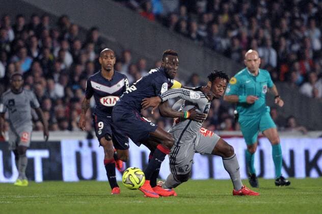 LAMINE SANE (bor) - Michy BATSHUAYI (om) FOOTBALL : Bordeaux vs Marseille - Ligue 1 - 12 04 2015 FEP Panoramic 