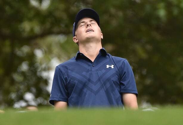 Jordan Spieth reacts after he hits his tee shot on the 4th hole in the final round of the 2015 Masters Tournament at Augusta National Golf Club in Augusta, Georgia on April 12, 2015.  AUG20150412107 KEVINxDIETSCH
