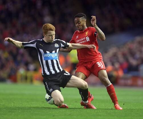 Jack Colback of Newcastle United tackles Raheem Sterling of Liverpool - Liverpool vs. Newcastle United - Barclay s Premier League - Anfield - Liverpool - 13 04 2015 Pic Philip Oldham Sportimage EDITORIAL USE ONLY. No use with unauthorised audio, video, data, fixture lists, club league logos or live services. Online in-match use limited to 120 images, no video emulation. No use in betting, games or single club league player publications.