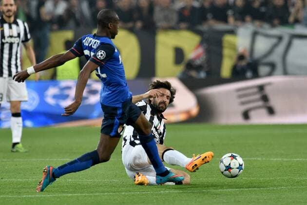 14.04.2015. Juventus Stadium, Turin, Italy. Champions League quarter-final first leg Juventus versus Monaco. Andrea Pirlo (Juv) challenges Geoffrey Kogodbia (Mon) xGiuseppexMaffiax  ActionPlus11613053