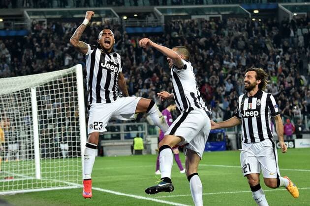 14.04.2015. Juventus Stadium, Turin, Italy. Champions League quarter-final first leg Juventus versus Monaco. Arturo Vidal celebrates after he scored the 1-0 goal for Juventus from the penalty spot with Leonardo Bonucci xGiuseppexMaffiax  ActionPlus11613064