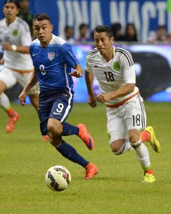 April 15, 2015. . Andres Guardado 18 of Mexico in action vs the USA soccer team at the Alamodome in an International Friendly Länderspiel in San Antonio Texas. The U.S. defeats Mexico 2 - 0. SOCCER 2015: USA vs Mexico APR 15 - ZUMAc04_