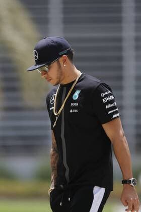 April 16, 2015 - Sakhir, Kingdom of Bahrain - LEWIS HAMILTON of Great Britain and Mercedes AMG Petronas F1 Team is seen in the paddock during preparations to the 2015 Formula 1 Bahrain Grand Prix at Bahrain International Circuit in Sakhir, Kingdom of Bahrain. F1 2015 - Bahrain Grand Prix - Preparations - ZUMAg147