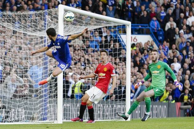 18.04.2015. London, England. Barclays Premier League. Chelsea versus Manchester United ManU Chelsea s Eden Hazard has a chance but can t steer the ball into the net xCraigxMercerx  ActionPlus11614049