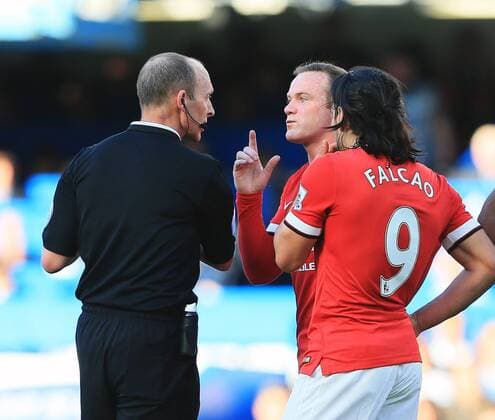 Manchester United ManU s Wayne Rooney and Radamel Falcao complain to referee Mike Dean after the award of Chelsea s opening goal Barclays Premier League- Chelsea vs Manchester United - Stamford Bridge - England - 18th April 2015 - Picture David Klein Sportimage EDITORIAL USE ONLY. No use with unauthorised audio, video, data, fixture lists, club league logos or live services. Online in-match use limited to 120 images, no video emulation. No use in betting, games or single club league player publications.