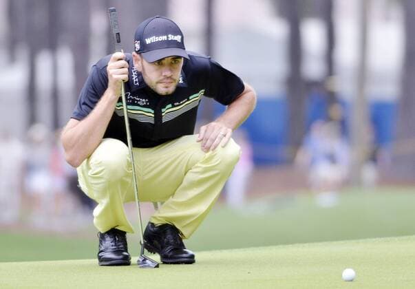 April 18, 2015 - Hilton Head Island, SC, USA - Troy Merritt sizes up a putt on the 1st green during the third round of the RBC Heritage Presented by Boeing on Saturday, April 18, 2015, at Harbour Town Golf Links on Hilton Head Island, S.C. HeritaRBC Heritage Presented by Boeing, third round - ZUMAm67_