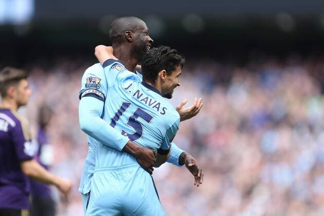 Jesus Navas of Manchester City celebrates the opening goal with Yaya Toure - Manchester City vs. West Ham United - Barclay s Premier League - Etihad Stadium - Manchester - 19 04 2015 Pic Philip Oldham Sportimage EDITORIAL USE ONLY. No use with unauthorised audio, video, data, fixture lists, club league logos or live services. Online in-match use limited to 120 images, no video emulation. No use in betting, games or single club league player publications.